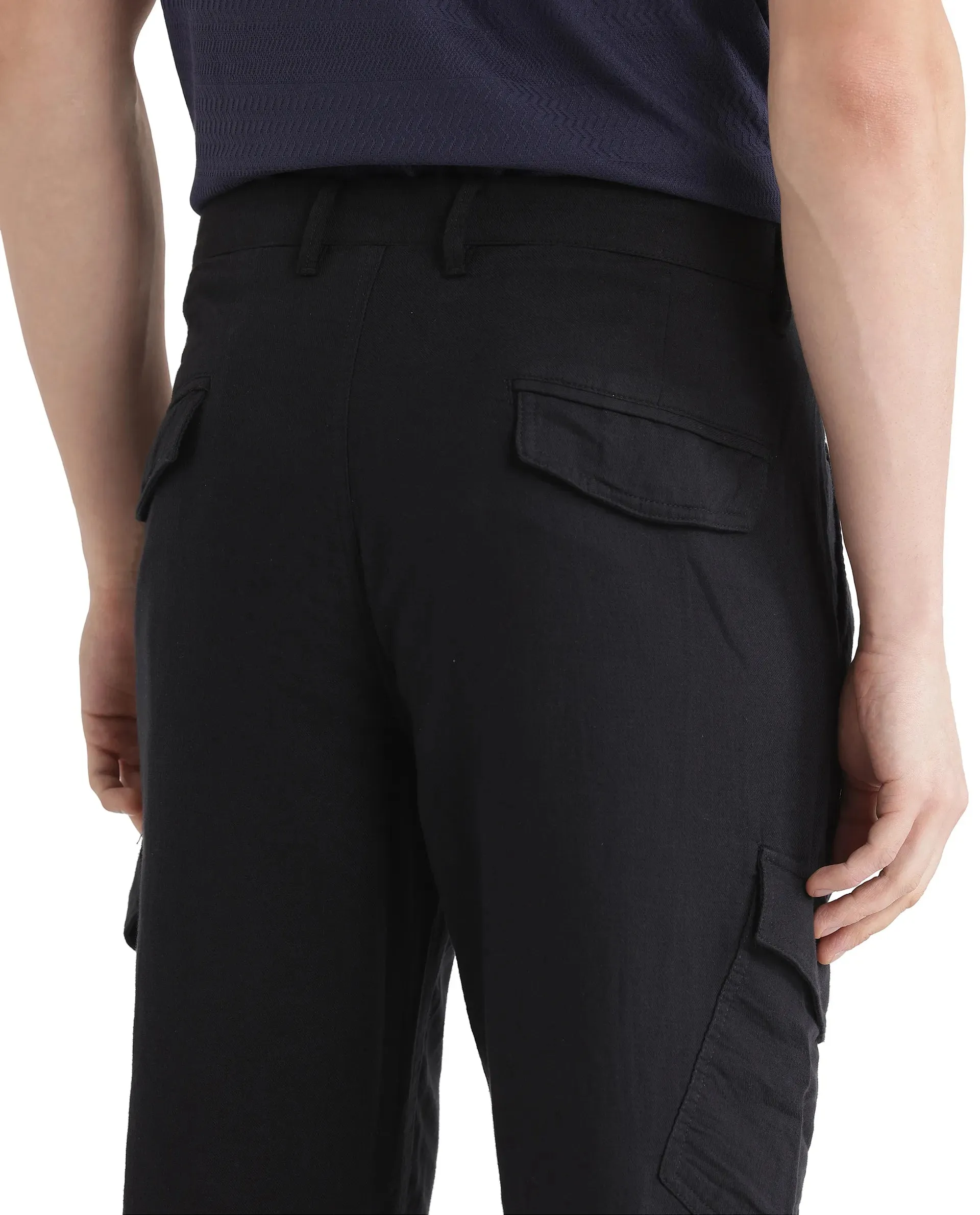 Rare Rabbit Men Presso-25 Black Cotton Elastane Fabric Button And Zip Closure Relaxed Fit Plain Trouser