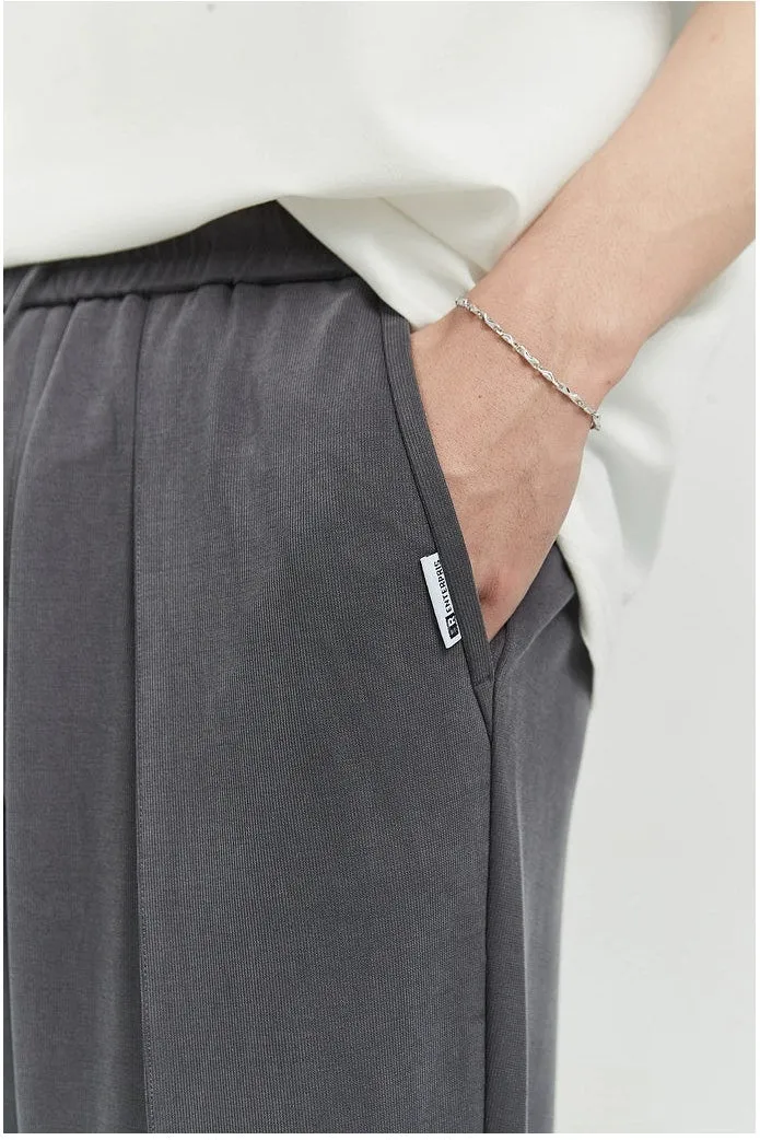 Slim Pleated Tapered Trousers with Pockets