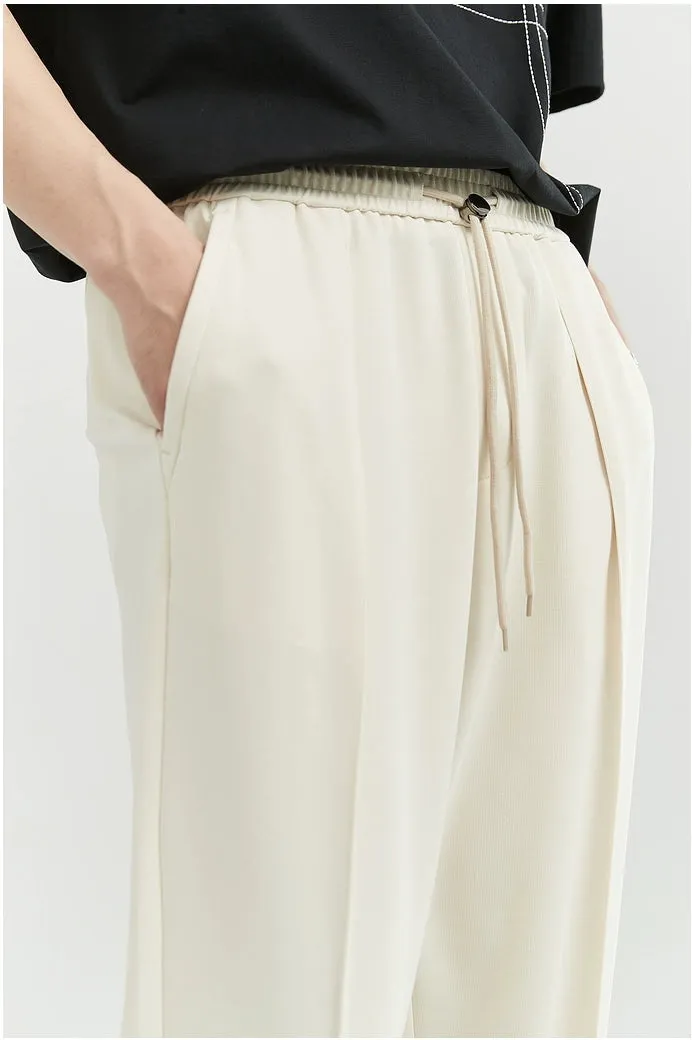 Slim Pleated Tapered Trousers with Pockets