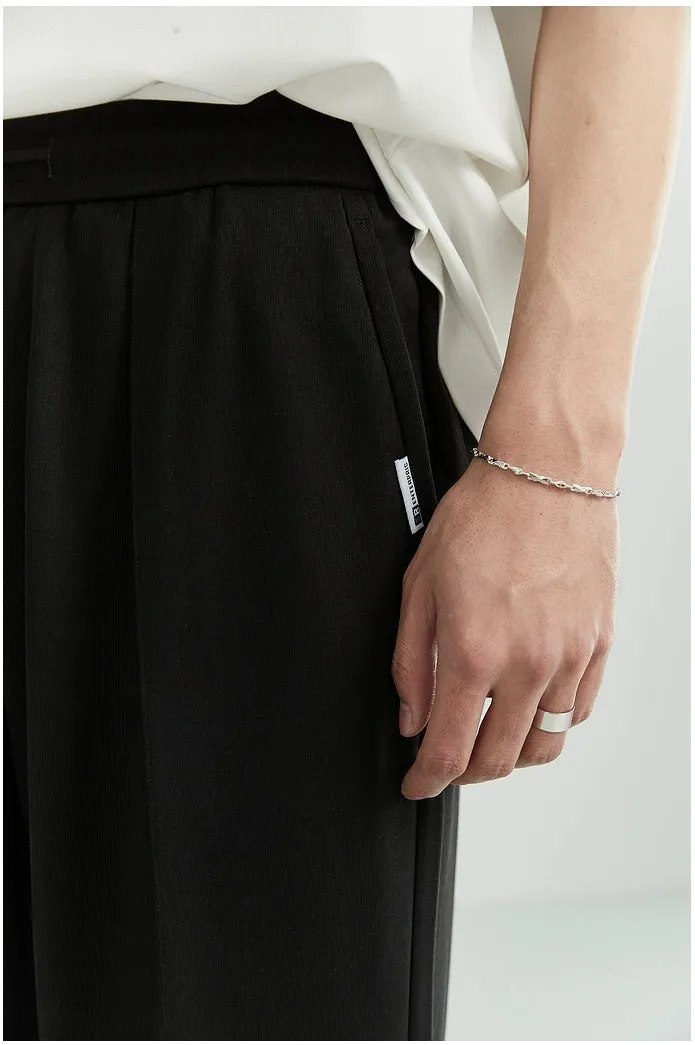 Slim Pleated Tapered Trousers with Pockets