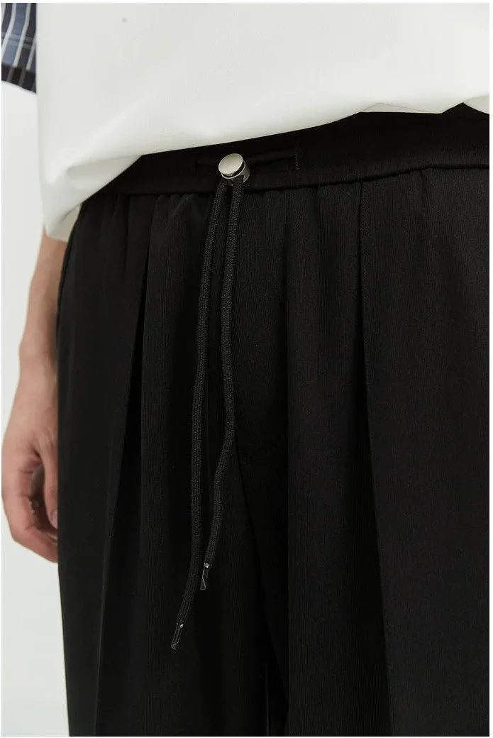 Slim Pleated Tapered Trousers with Pockets