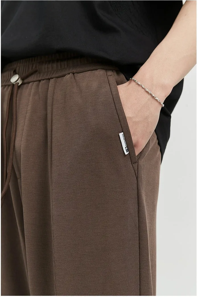 Slim Pleated Tapered Trousers with Pockets